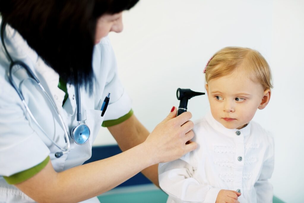 pediatrician doing ear exam baby girl 2